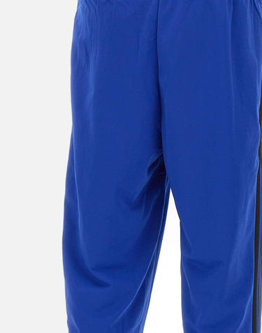 Pantaloni "Firebird TP" JY1352 BLUBLK ADIDAS