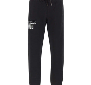 OFF-WHITE Pantaloni di tuta "Motion Arrow Cuffed" BLACK Uomo 
