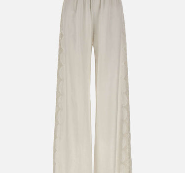 Pantaloni in lino con dettagli in pizzo W01210781 OFFWHITE MAURIZIO MYKONOS 