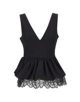 ROTATE Top a peplo con scollo a V BLACK Donna 