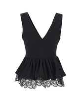 ROTATE Top a peplo con scollo a V BLACK Donna 