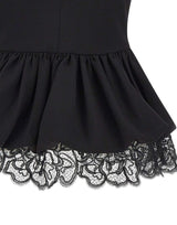 ROTATE Top a peplo con scollo a V BLACK Donna 