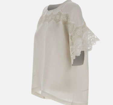 Blusa in lino ricamata W08460781 OFFWHITE MAURIZIO MYKONOS 