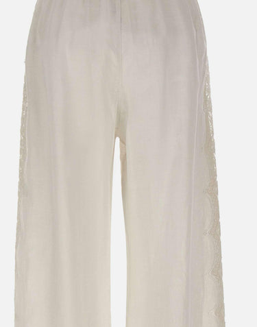 Pantaloni in lino con dettagli in pizzo W01210781 OFFWHITE MAURIZIO MYKONOS 