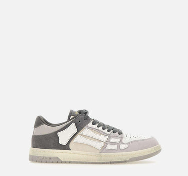 Sneakers "Distressed Skel Top Low" AMFOSR1168 904 AMIRI 