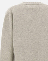 Maglione in lana con firma Margiela S52HL0065 M13288806S MM6 MAISON MARGIELA 